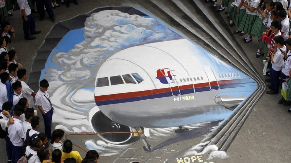 Graffiti auf dem Boden des Flugs MH370.