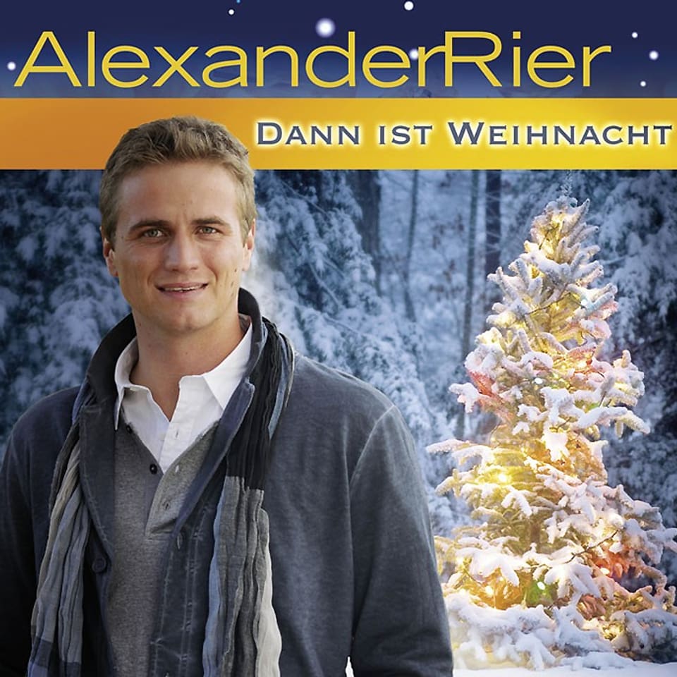 CD-Cover «Dann ist Weihnacht» von Alexander Rier. Der Sänger steht in einer winterlichen Landschaft vor einem beleuchteten Tannenbaum.