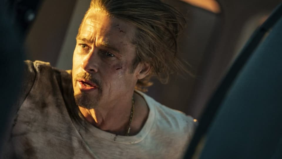 Brad Pitt mit blutigem Gesicht.