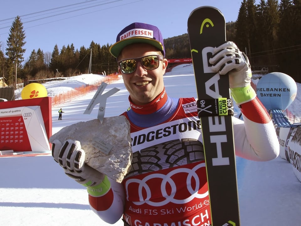 In der letzten Abfahrt vor den Olympischen Winterspielen schlägt der «Kugelblitz» in Garmisch-Partenkirchen zu und gewinnt vor Vincent Kriechmayr (AUT) und Dominik Paris (ITA).