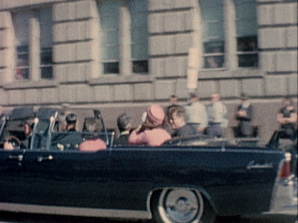 Kennedy und Jackie im Auto.