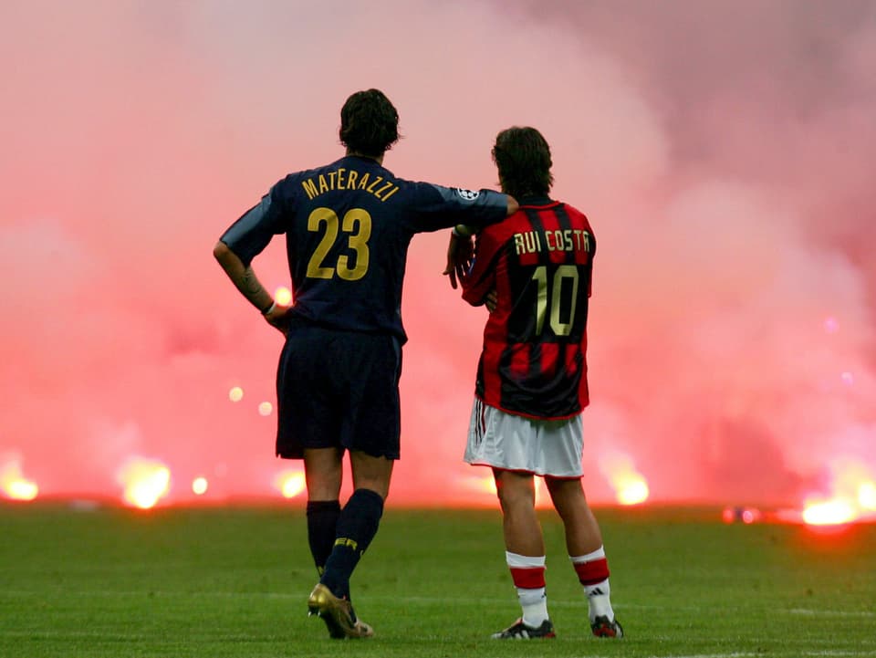 Marco Materazzi und Rui Costa