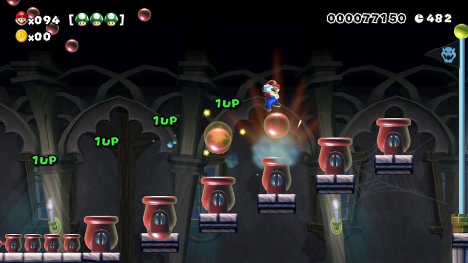 Mario hüpft auf Kanonenkugeln in die Höhe.