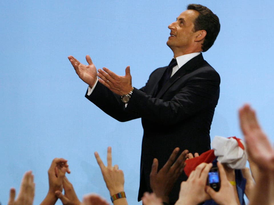 Nicolas Sarkozy, France's newly-elected president, speaks to supporters in Paris after the election results announcement, May 6, 2007. Sarkozy defeated Socialist Party candidate Segolene Royal on Sunday.