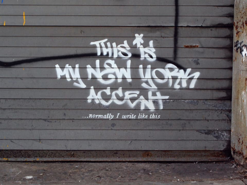 Graffiti «This is my New York accent» von Banksy.