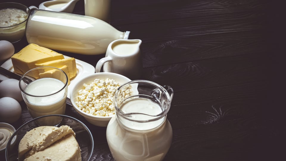 Dairy products on a table.