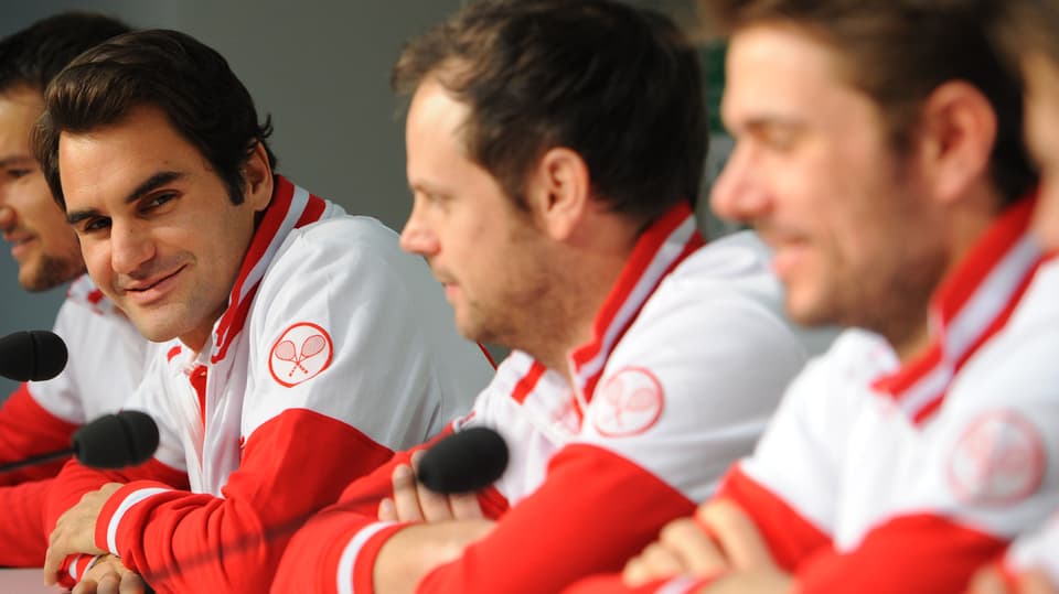Medienkonferenz der Schweizer-Delegation, Federer, Lüthi und Wawrinka lächeln allesamt.