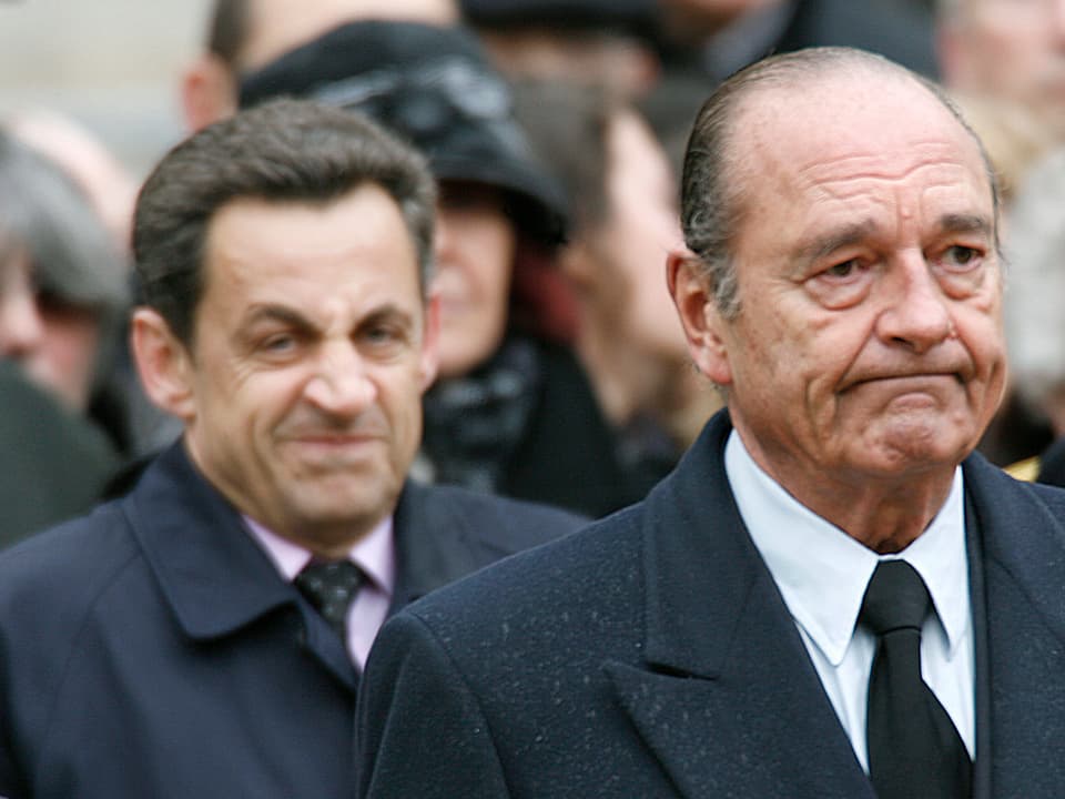 President Jacques Chirac (R) and Interior Minister and UMP political party presidential candidate Nicolas Sarkozy attend a ceremony to honour Lucie Aubrac, one of France's greatest wartime resistance heroes, in the courtyard of the Invalides in Paris March 21, 2007. Aubrac, who played a major role in the 1943 rescue of her husband Raymond Aubrac from a Nazi prison, died aged 94.