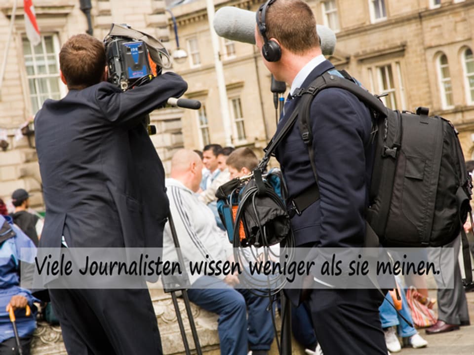 Reporter filmen Streit.