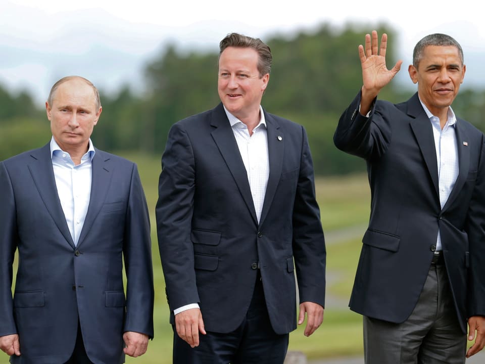US-Präsident Barack Obama posiert mit Russlands Präsident Vladimir Putin und Grossbritanniens Premierminister David Cameron während eines G8-Gipfels im Lough Erne Golf Resort in Enniskillen, Nordirland.