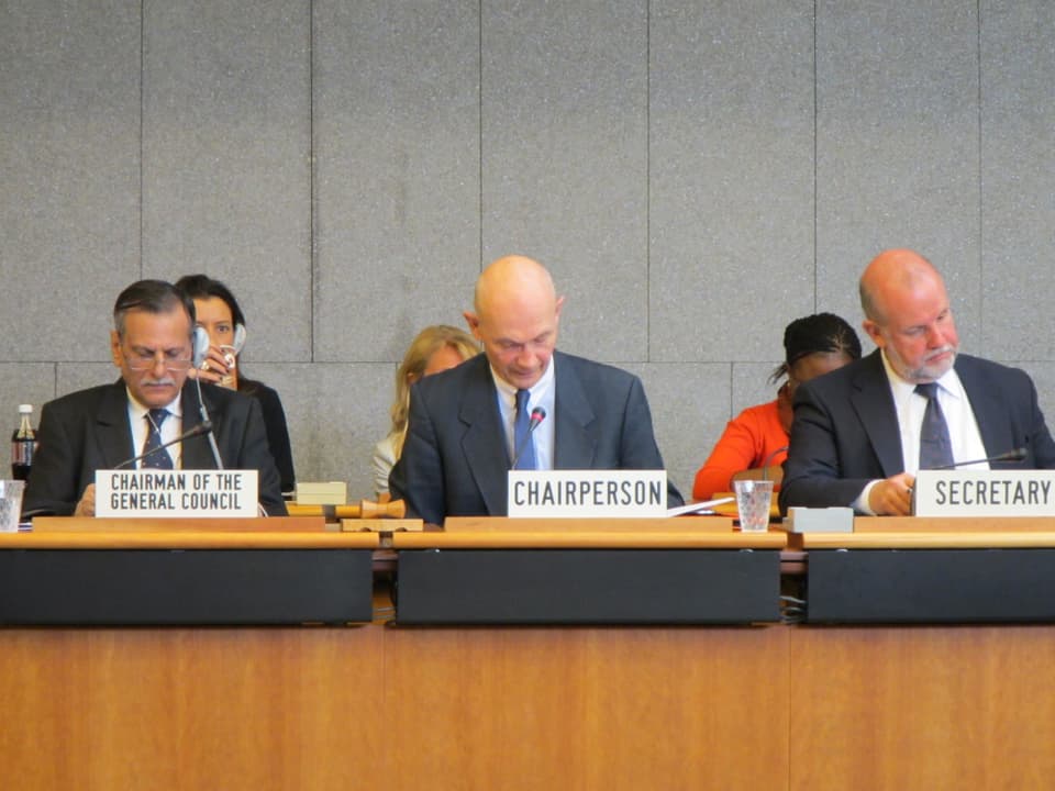 WTO-Generalsekretär Pascal Lamy und zwei weitere Konferenz-Teilnehmer.