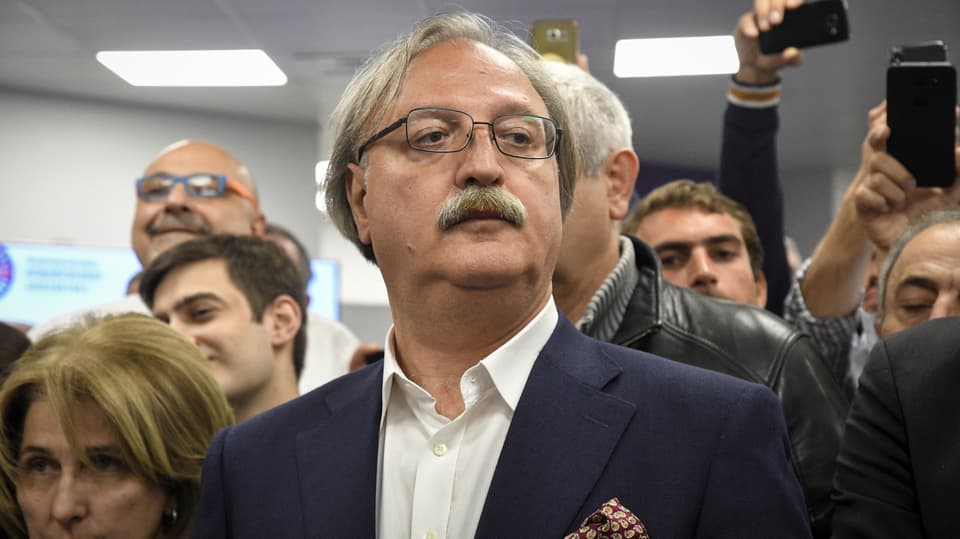 Grigol Waschadse mit Brille und Schnauz.