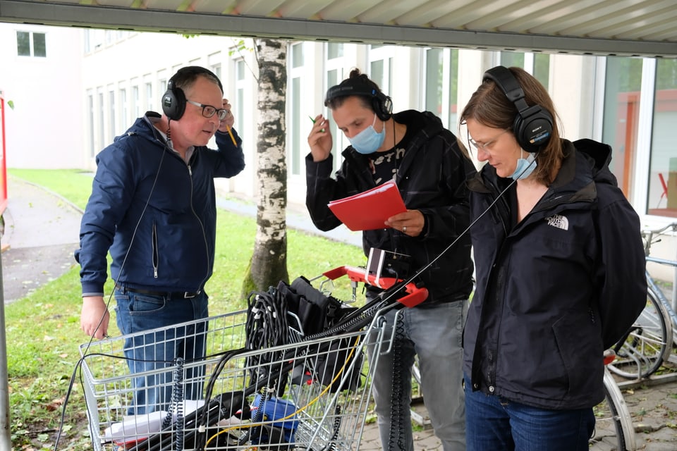 Director Ritu Ott, radio sound engineer Roli Fitzer, and assistant director Zeta Burnett.  external shots.