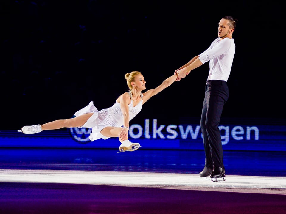 Tatiana Volosozhar und Maxim Trankov auf dem Eis.