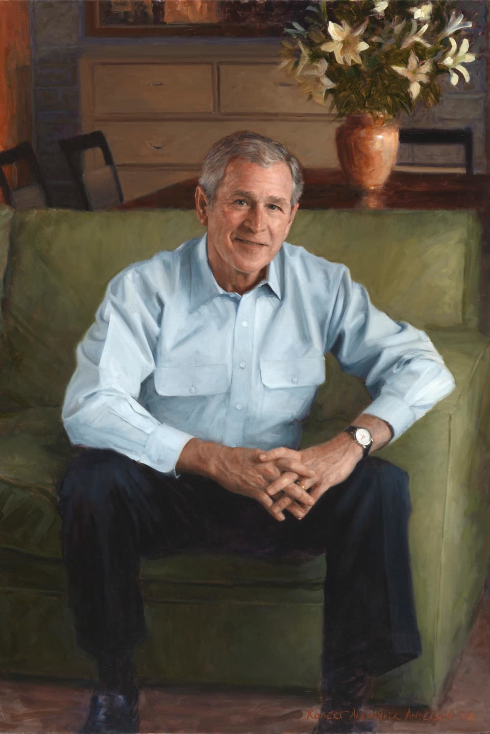 George W. Bush auf einem Sofa.