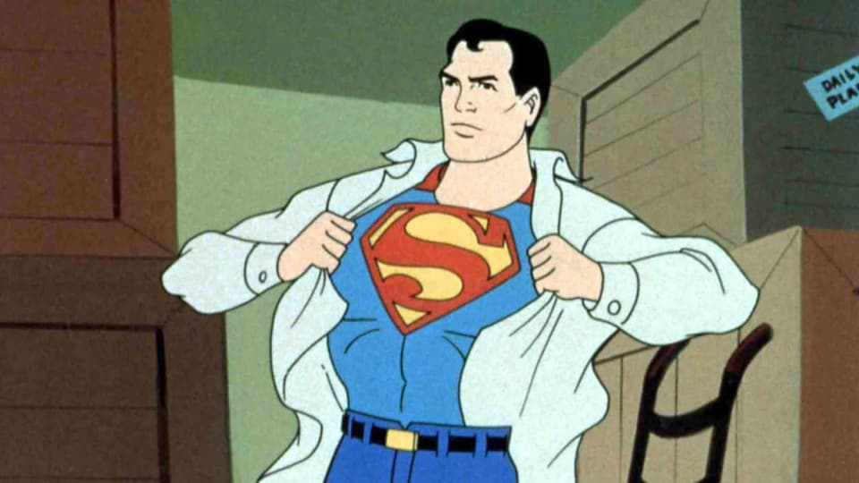 Comicfigur Superman zieht sein Hemd aus. Darunter kommt der Superheldendress mit dem roten S zum Vorschein.