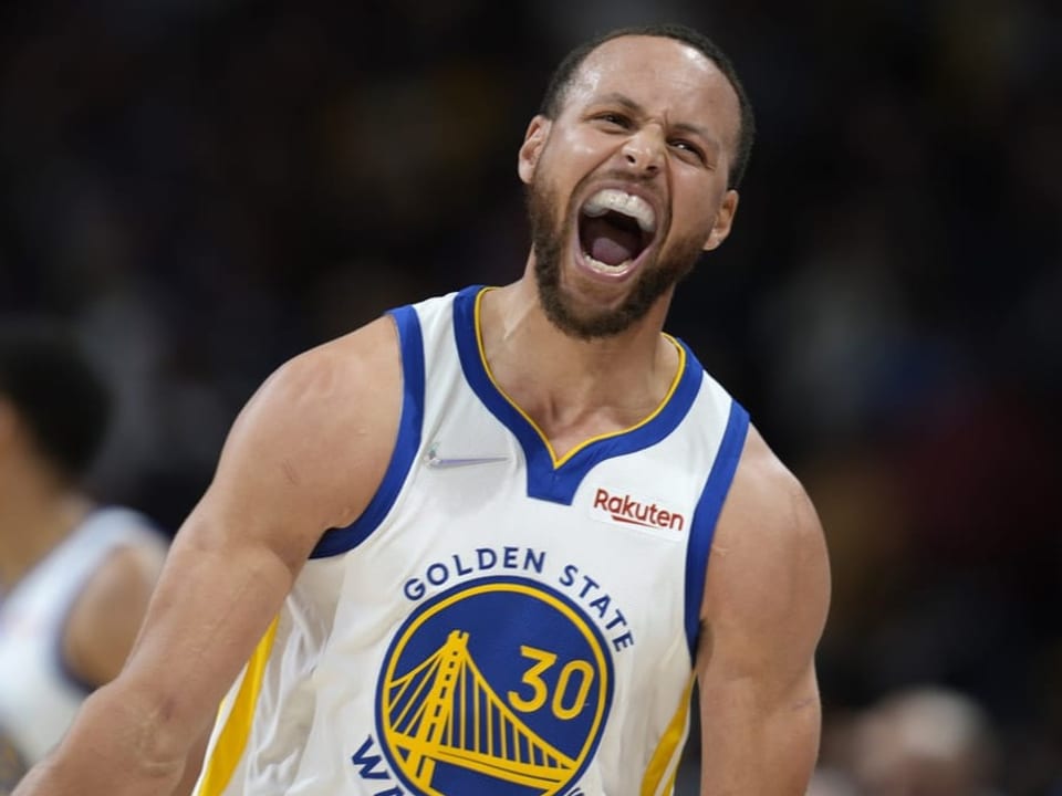 Stephen Curry Stephen Curry schreit seine Freude heraus.
