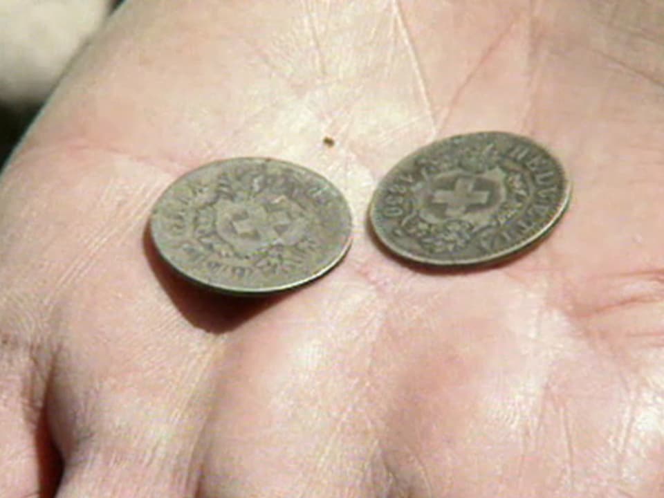 eine Münze von 1850 und ein Fälschung von Farinet