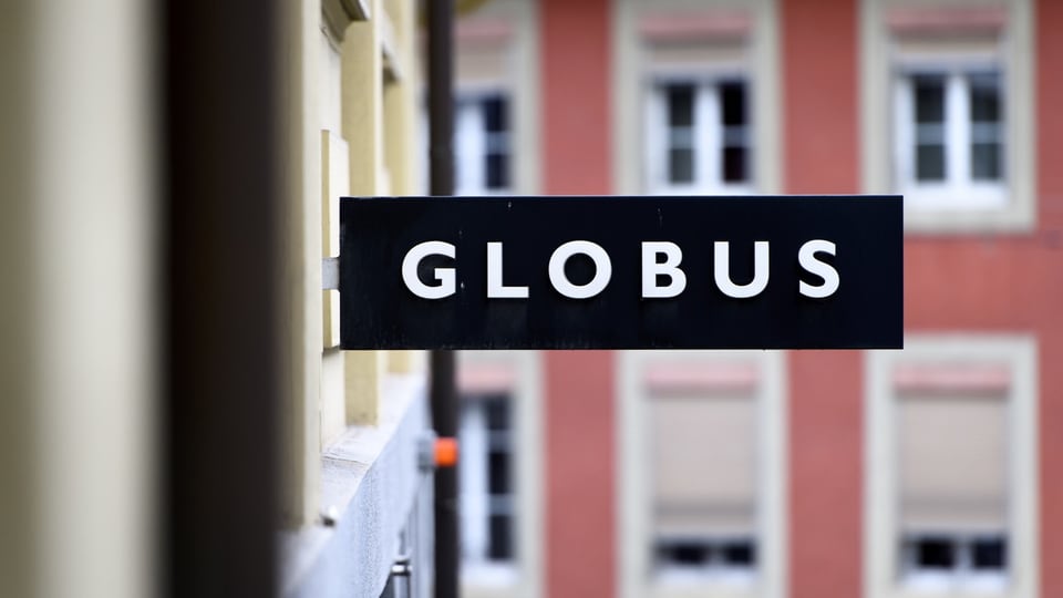 Globus-Schild.