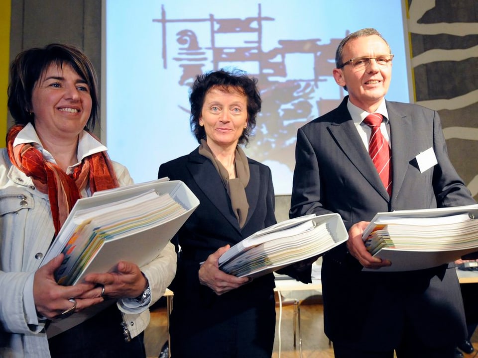 Philippe Perrenoud mit Bundesrätin Eveline Widmer-Schlumpf und Elisabeth Baume-Schneider. 