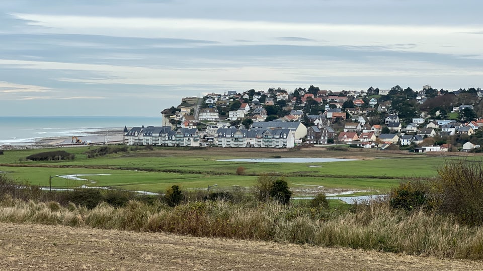 A photo from a distance above the village of Creel-sur-Mer on the northern coast of France.