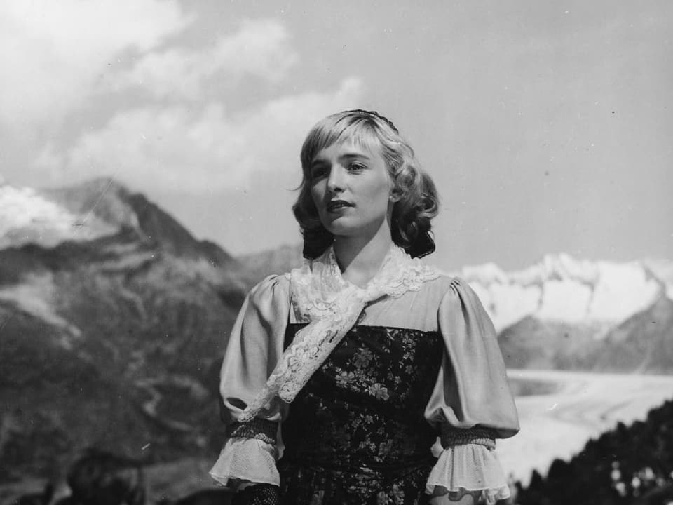 Portrait von Jacqueline vor einem Gletscher.