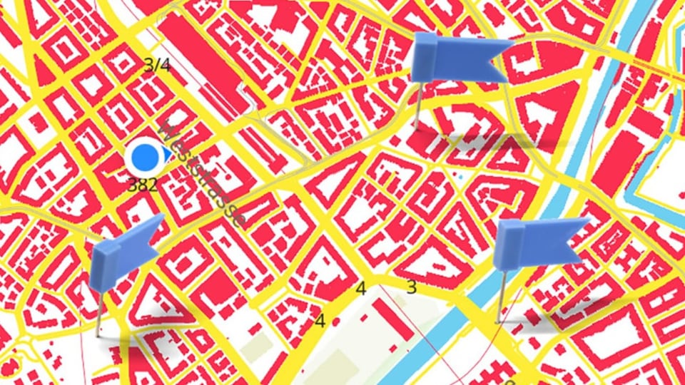Bunte Stadtkarte von Zürich mit diversen Fähnchen