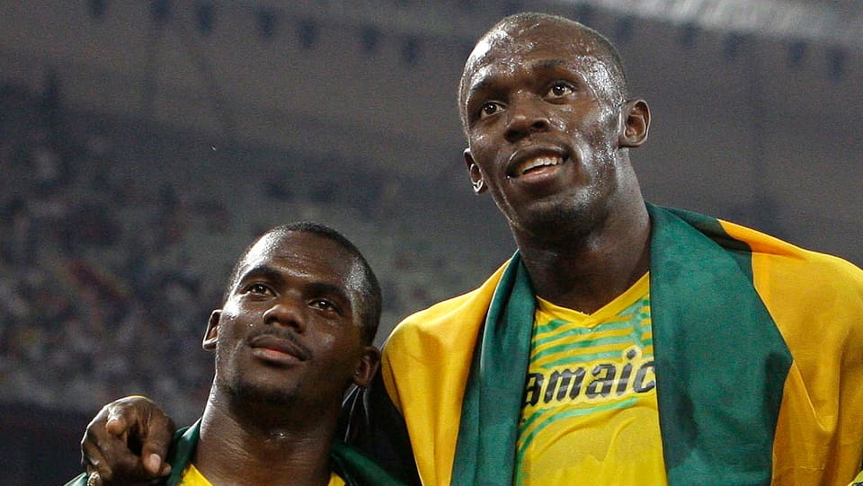Usain Bolt und Staffelkollege Nesta Carter.
