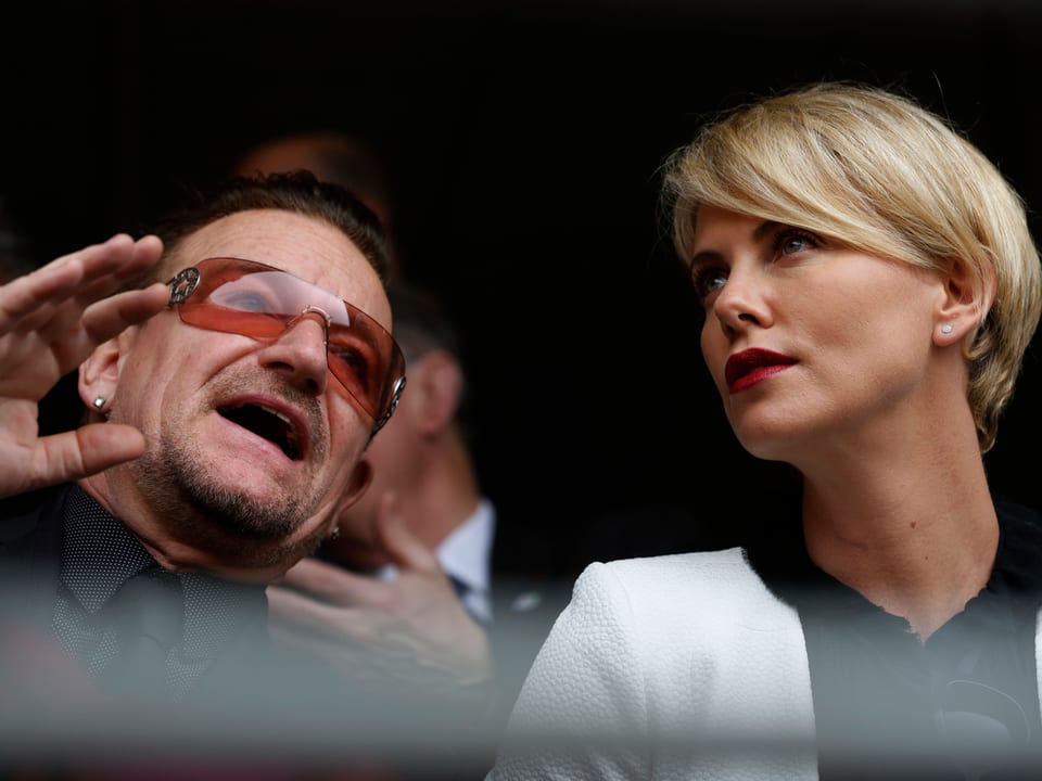 Bono und Charlize Theron.