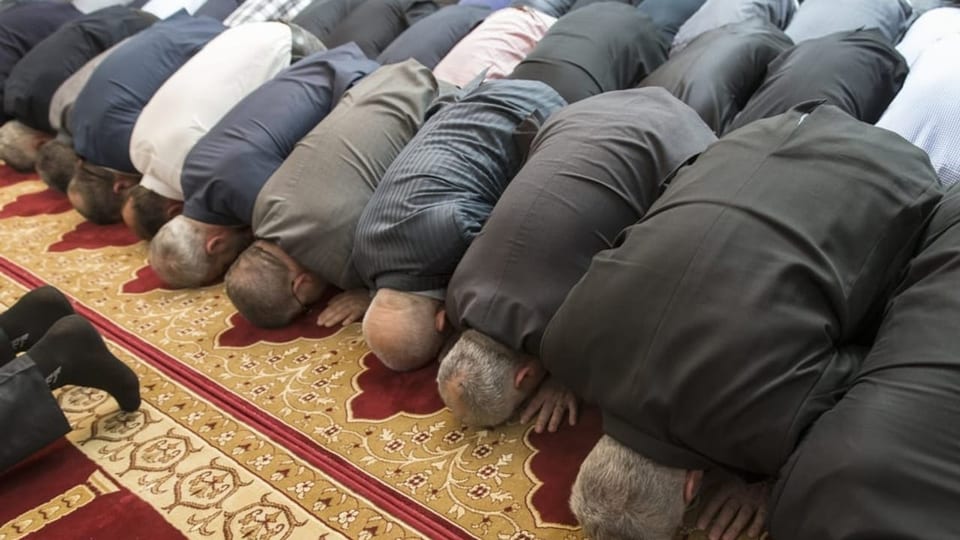 Muslime beim Beten