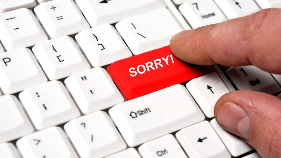 Das Wort Sorry auf einer Computer-Tastatur.