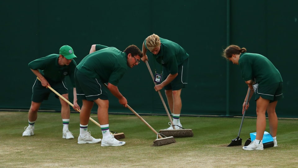 Die Rasenpfleger in Wimbledon. 
