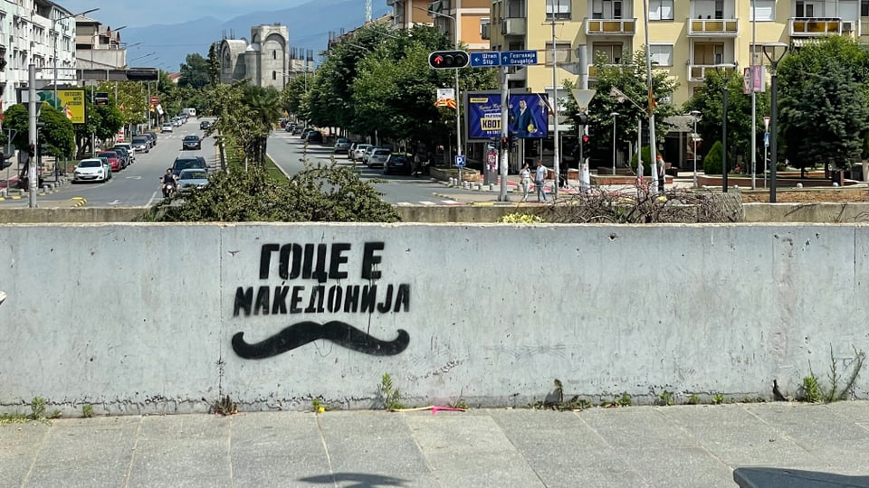 Graffiti on a wall on a street in North Macedonia.