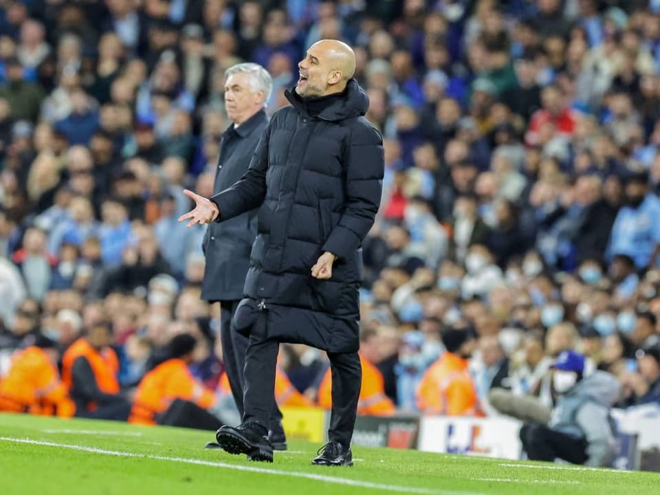 City-Coach Pep Guardiola (vorn) und Real-Pendant Carlo Ancelotti.