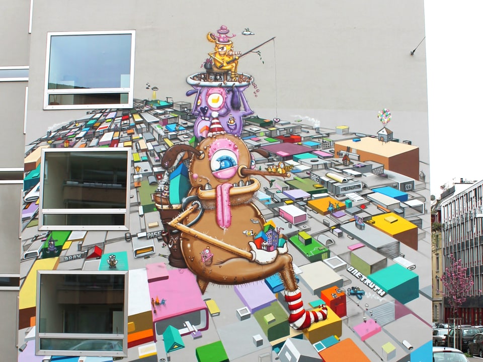 Das Graffiti zum Thema Playground zeigt ein farbenfrohes Urbangebiet