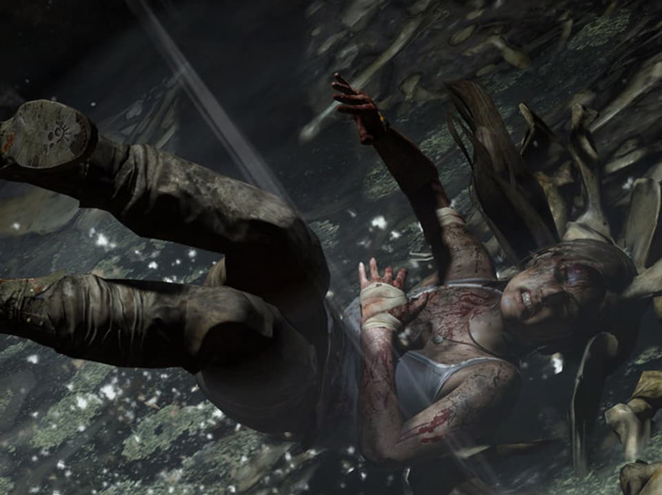 Ein Screenshot des Games «Tomb Raider» zeigt Lara Croft mit schmerzverzerrtem Gesicht.