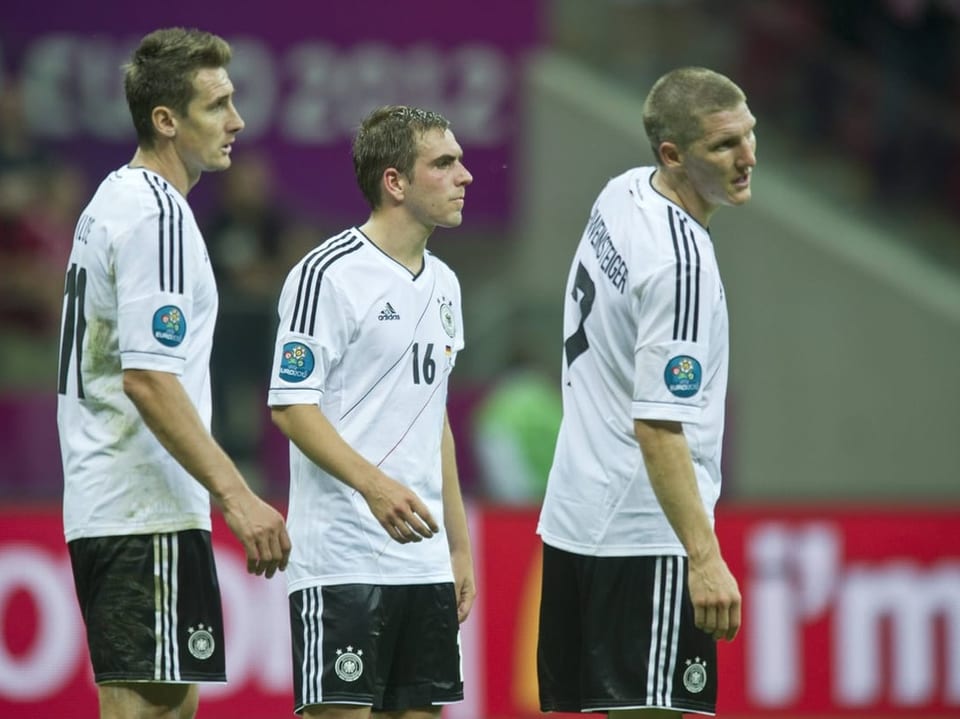 Miroslav Klose, Philipp Lahm und Bastian Schweinsteiger auf dem Spielfeld