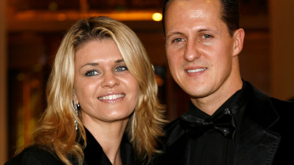 Corinna und Michael Schumacher lächelnd