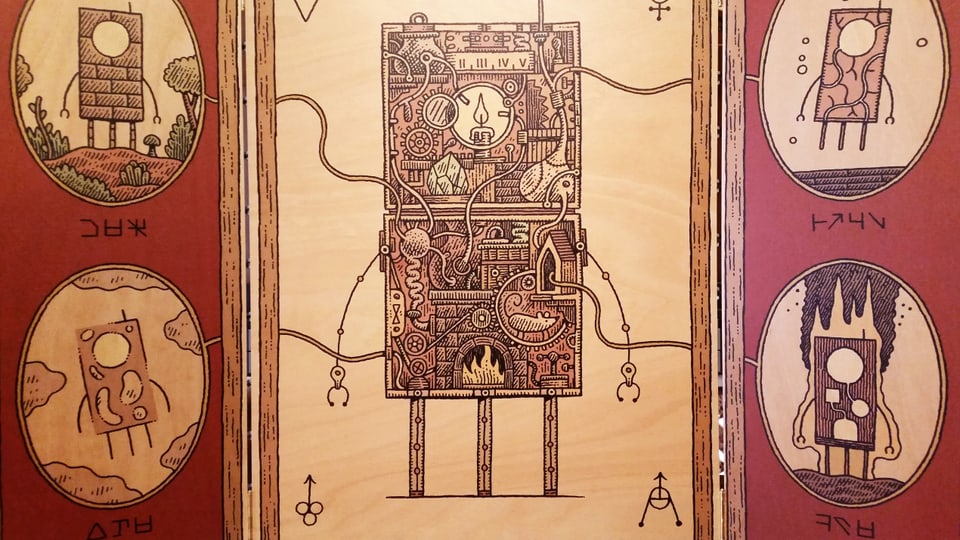 Altartafel aus Holz: Ein sehr rudimentärer Roboter, in dessen Innern ein Feuer brennt. In den Ecken: Vier Roboter, die die vier Elemente darstellen.