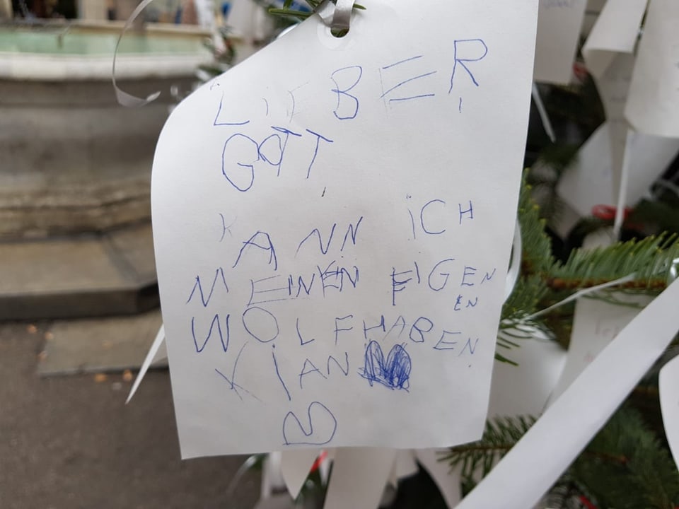 weisser Zettel, Kinderschrift: «Lieber Gott, kann ich meinen eigenen Wolf haben?»