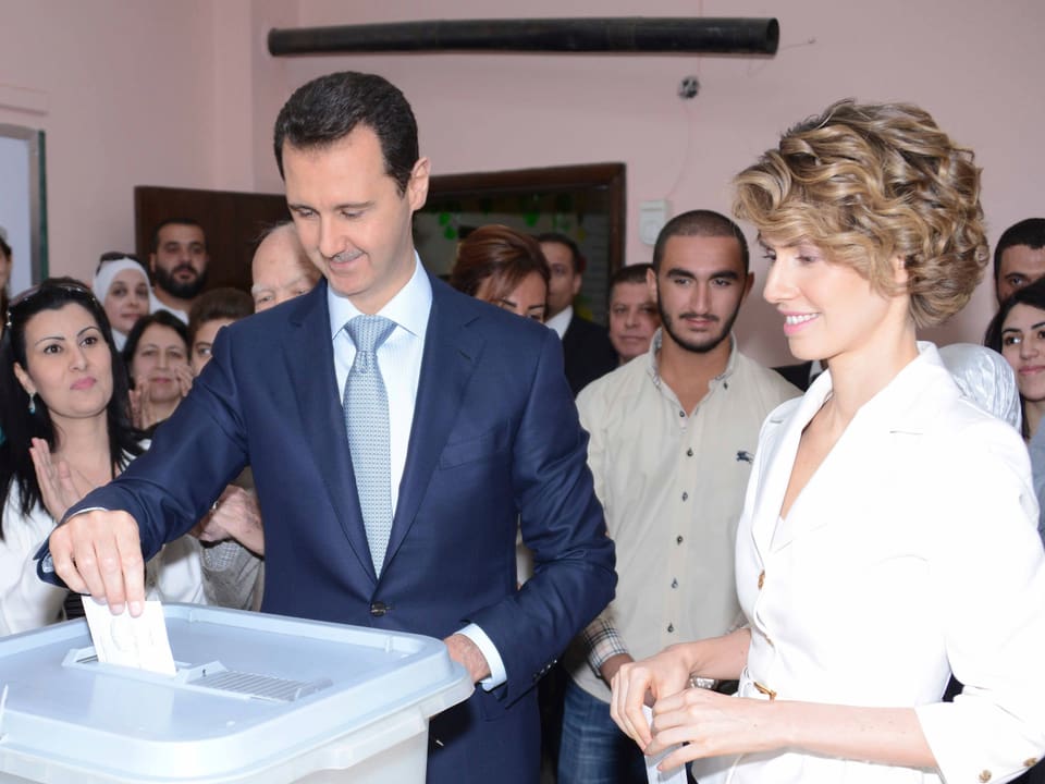 Präsident Assad und seine Frau Amsa wählen in Damaskus