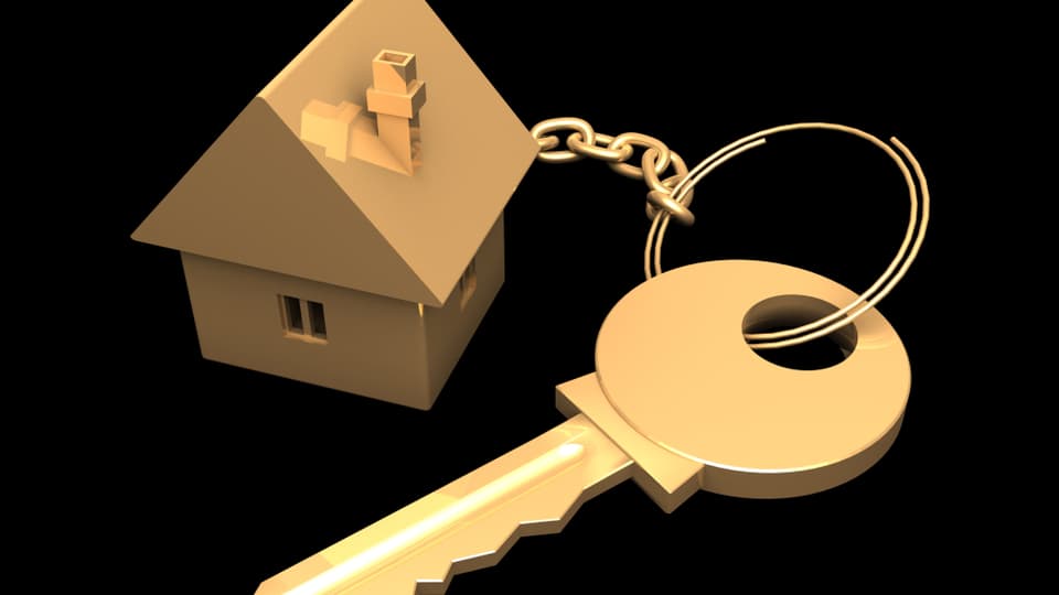 Schlüssel mit Haus-Modell