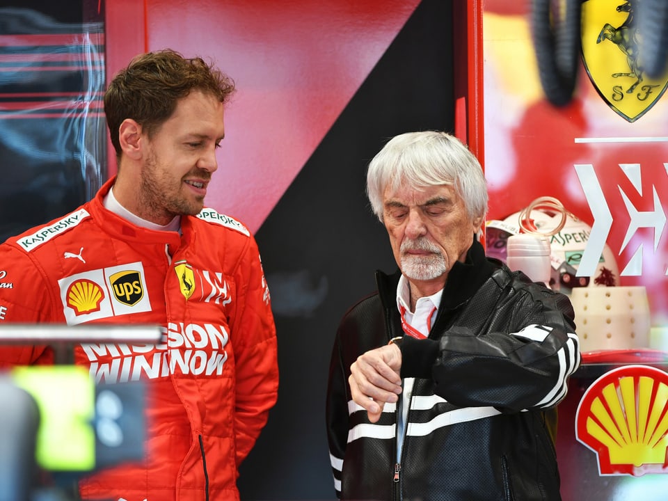Bernie Ecclestone (r.) hier im Gespräch mit Sebastian Vettel.