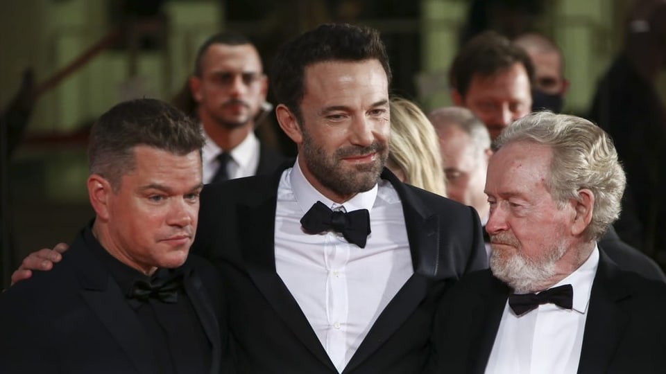 Matt Damon, Ben Affleck und Ridley Scott im Smoking anlässlich der Filmpremiere in Venedig.