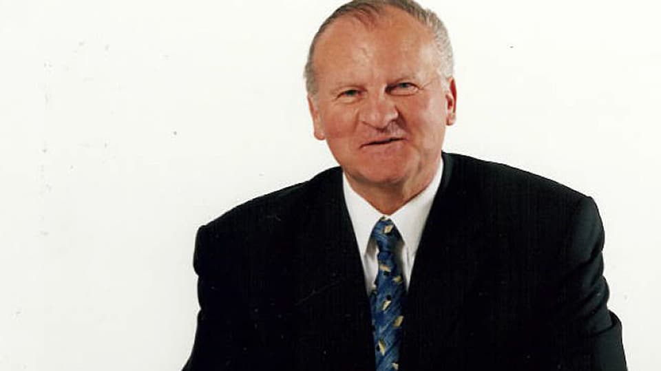 Porträt von Peter Galliker mit Krawatte.