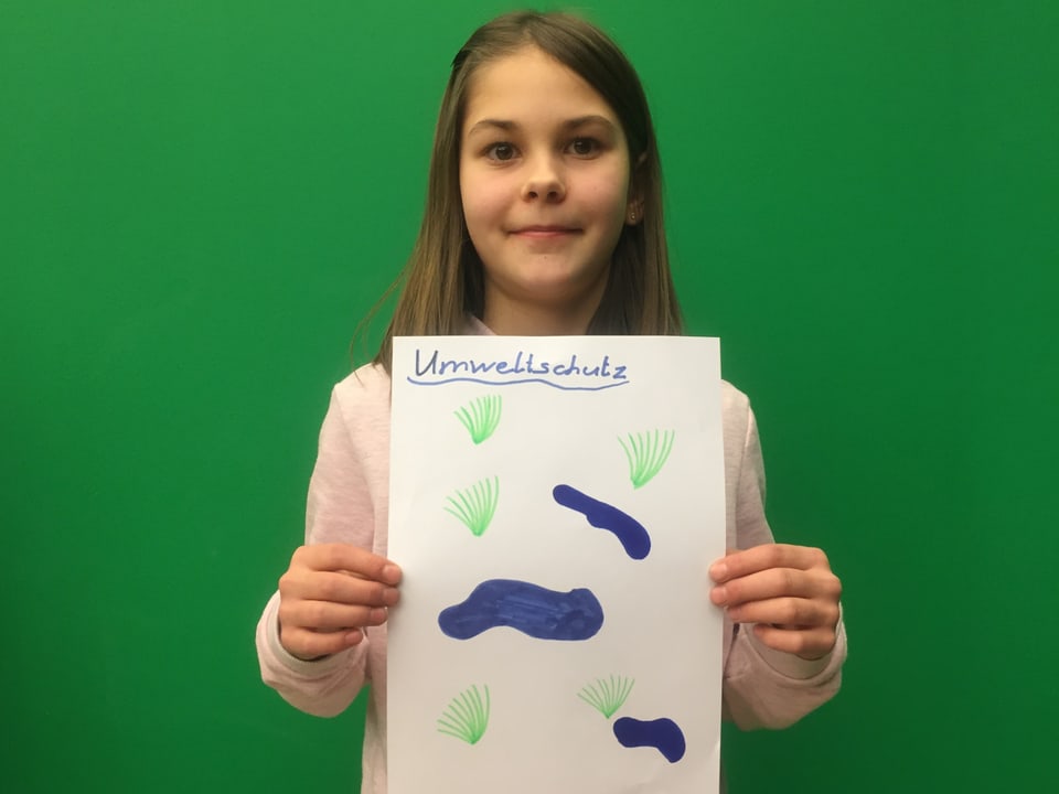 Svenja mit ihrem Plakat "Ja zum Umweltschutz"