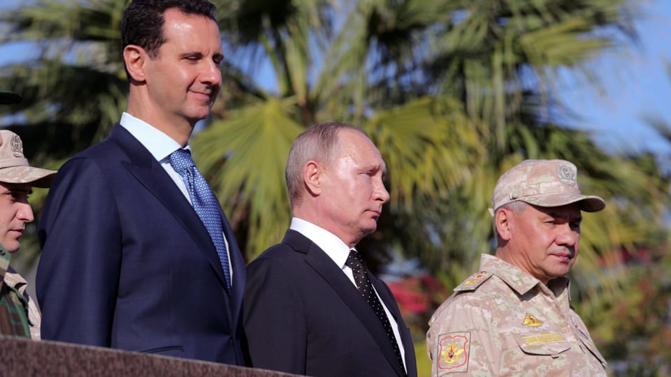 Syriens Staatschef Assad mit Russlands Präsident Putin bei dessen Besuch in Syrien im Dezember 2017. 