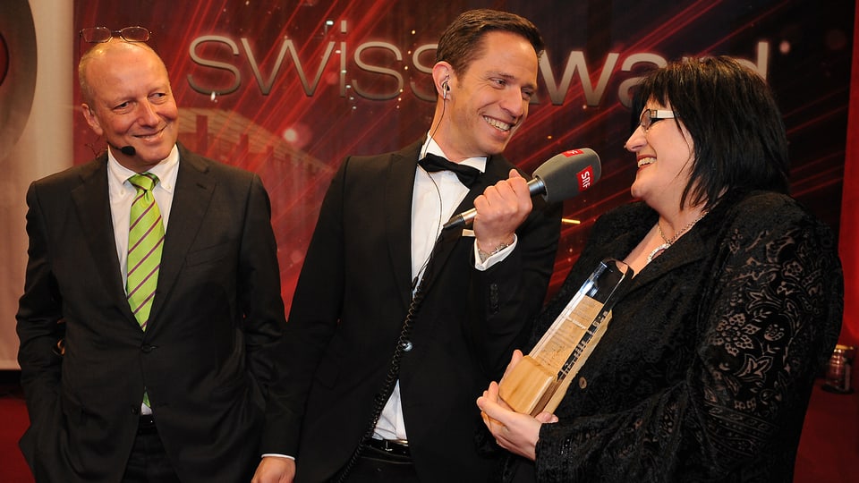 Zufriedene Gesichter SRG-Generaldirektor Roger de Weck, Radio SRF 1-Moderator Adrian Küpfer und Karin Boss-Röthlisberger.