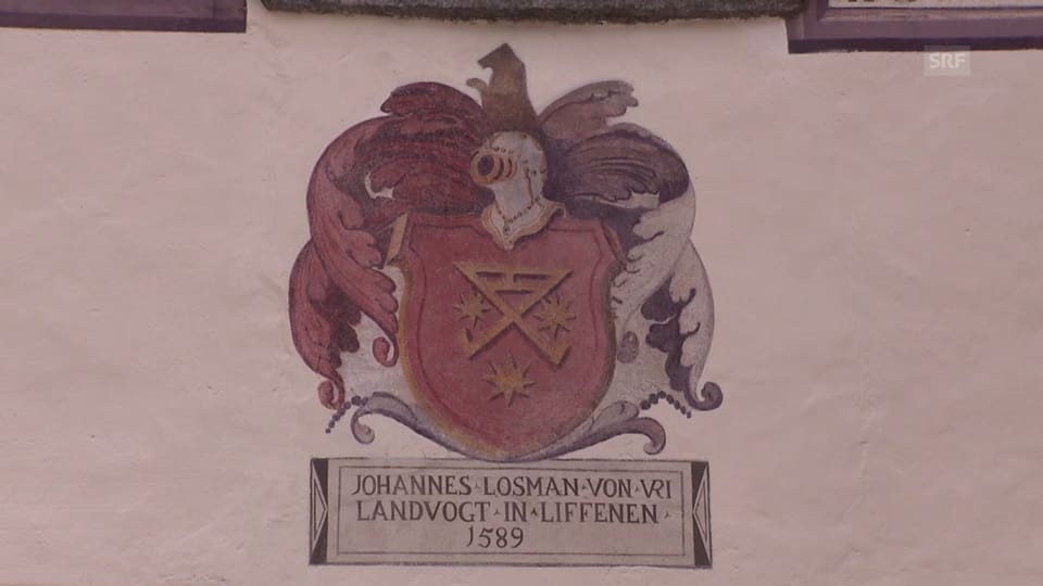 Farbige Zeichnung des Urner Wappens an einer Hausmauer