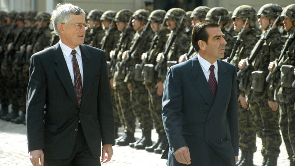 Federal President Caspar Williger inspects the military parade with Chilean President Eduardo Frei. 